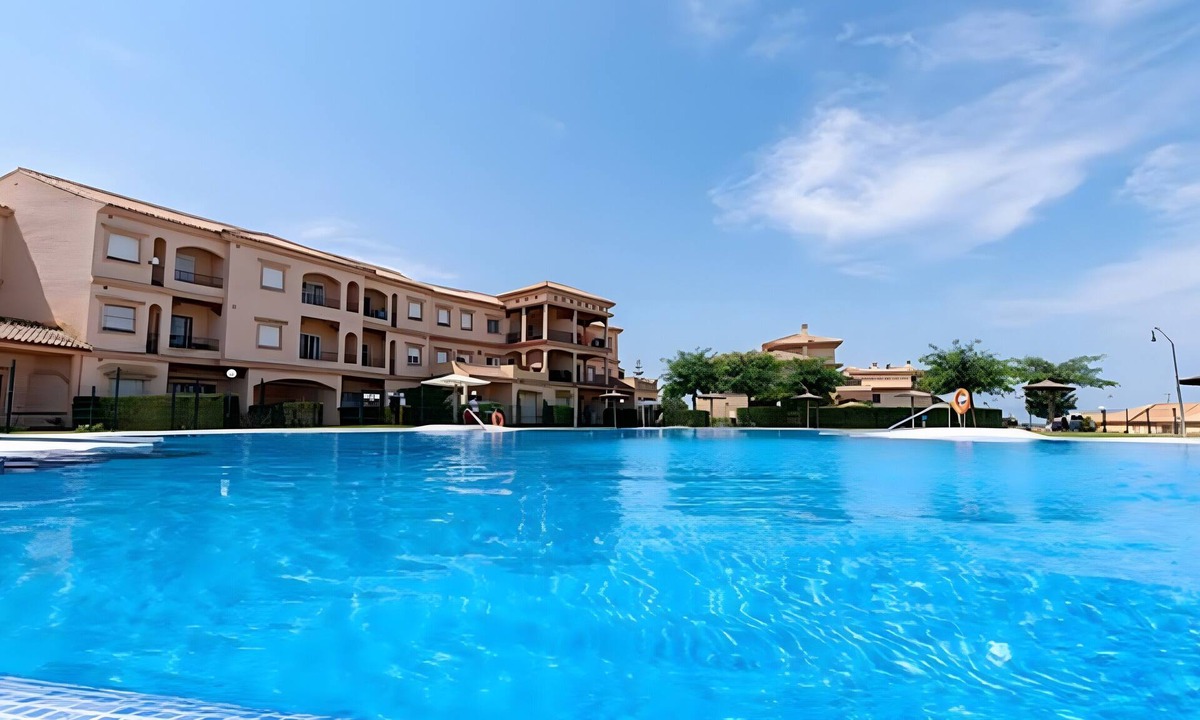 Sanlucar de Barrameda Apartment | Sanlúcar Club Terrace & Summer Pool – Views of Doñana National Park