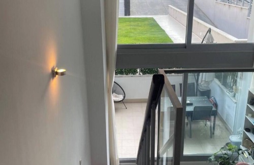 Villa de Vallecas Apartment | Modern duplex with swimming pool and gym surrounded by nature, 15 minutes from Atocha.
