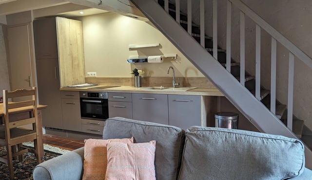 Charming self-catered two story, sleeping four with gated garden and shared pool in Soyaux