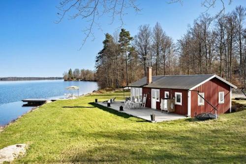Cottage With Beach Plot, Boat And Jetty In Småland in Moheda