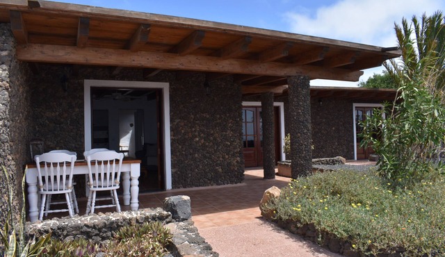 Volcanic lava stone house short walk to the beach, sea and mountain views